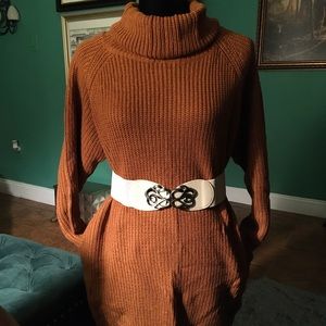 Over sized turtle neck sweater with pockets.